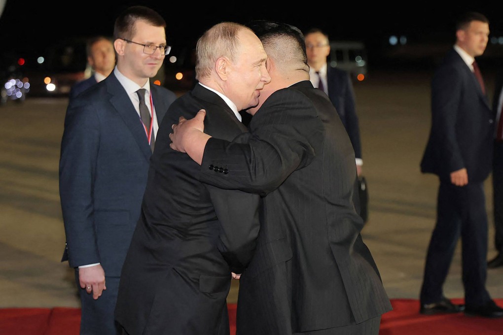 North Korean leader Kim Jong-un welcomes Russia’s President Vladimir Putin upon his arrival at Sunan International Airport in Pyongyang on Wednesday. Photo: KCNA via KNS/AFP