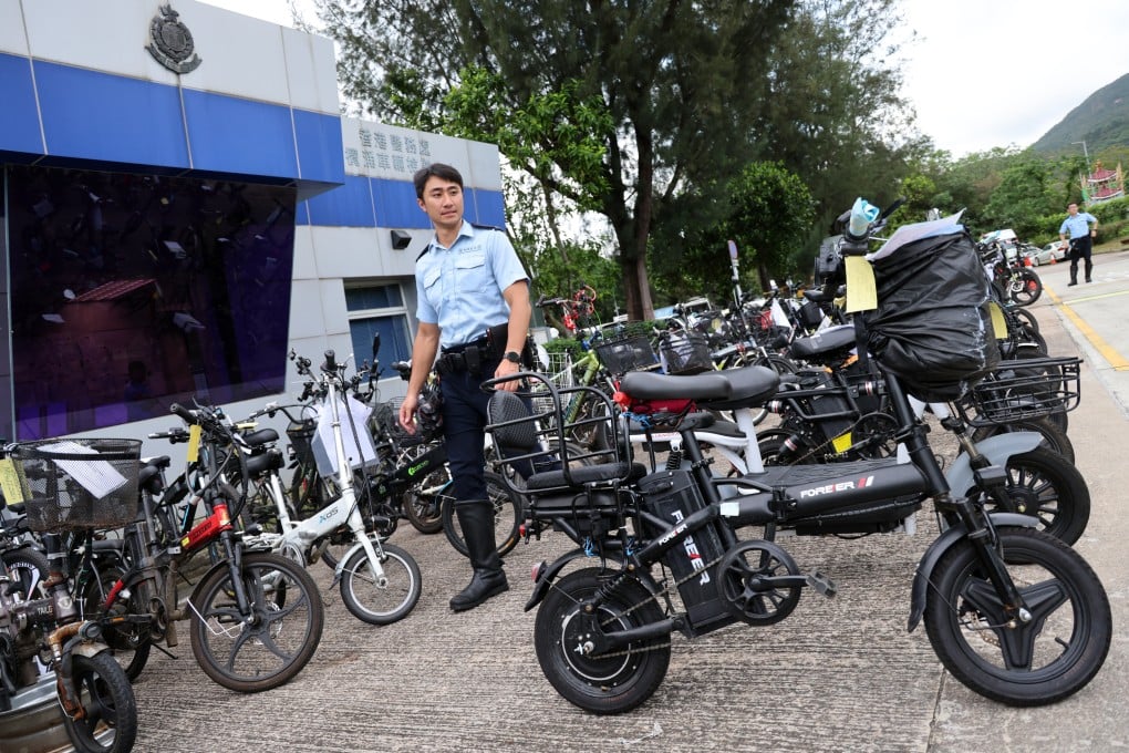 Police announce their latest crackdown on illegal use of electric mobility devices at Tai Lam Chung Vehicle Detention Centre. Photo: Jelly Tse