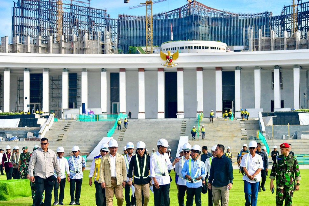 Indonesia’s President Joko Widodo (centre) inspecting the venue to be used for the country’s Independence Day celebrations in the future capital city of Nusantara in Penajam Paser Utara, East Kalimantan, on June 5. Photo: Handout / Indonesian Presidential Palace / AFP