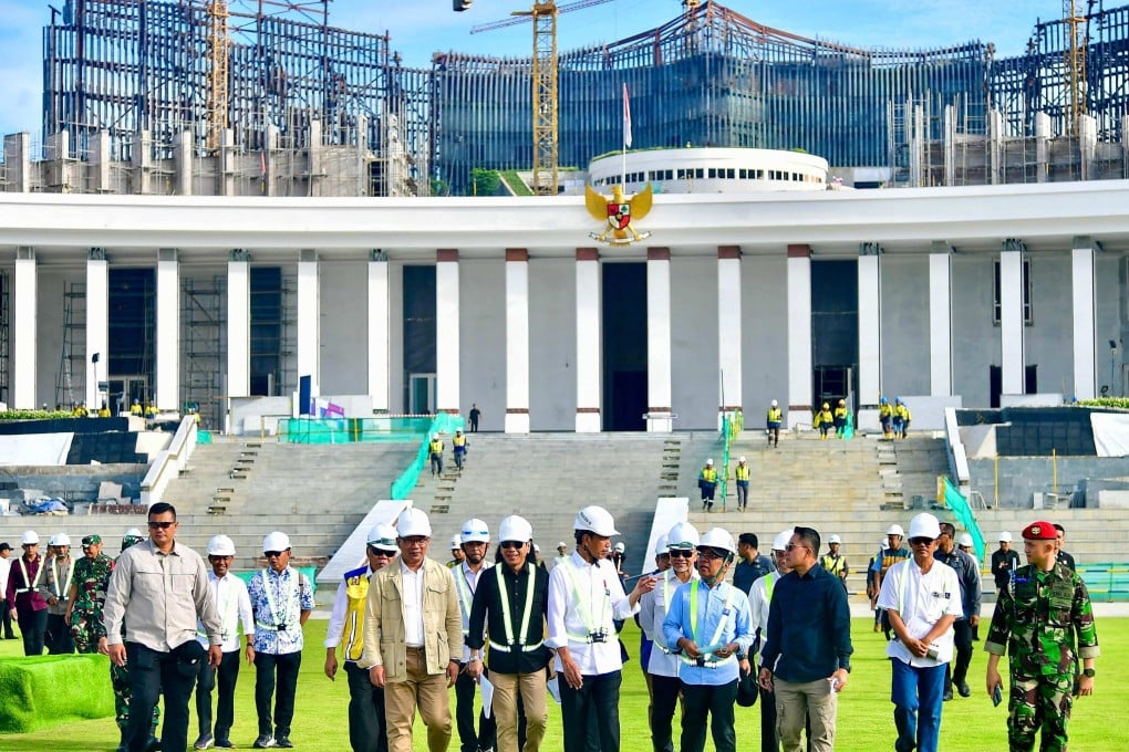Indonesia’s President Joko Widodo (centre) inspecting the venue to be used for the country’s Independence Day celebrations in the future capital city of Nusantara in Penajam Paser Utara, East Kalimantan, on June 5. Photo: Handout / Indonesian Presidential Palace / AFP