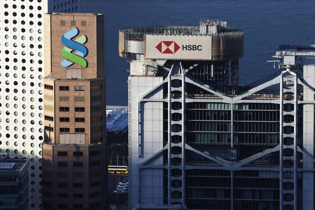 The logos of HSBC and Standard Chartered adorn their buildings in Central, Hong Kong. Photo: Nora Tam
