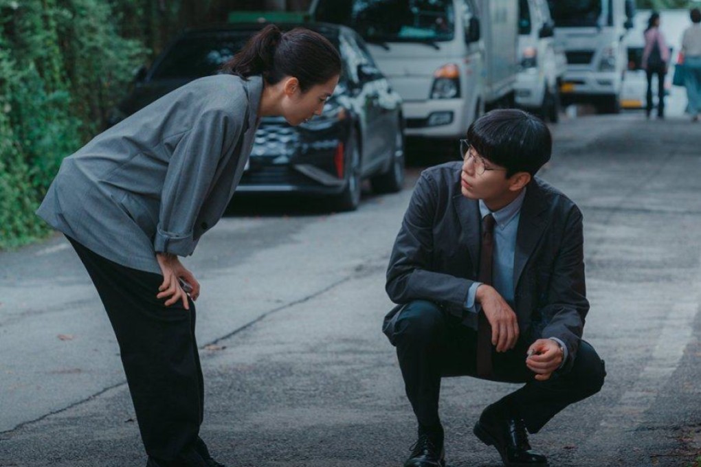 Kwak Sun-young (left) as the head of a police traffic crime investigation unit and Lee Min-ki as a new recruit to the team who’s haunted by his own traffic crime in a still from Disney+ K-drama series Crash.
