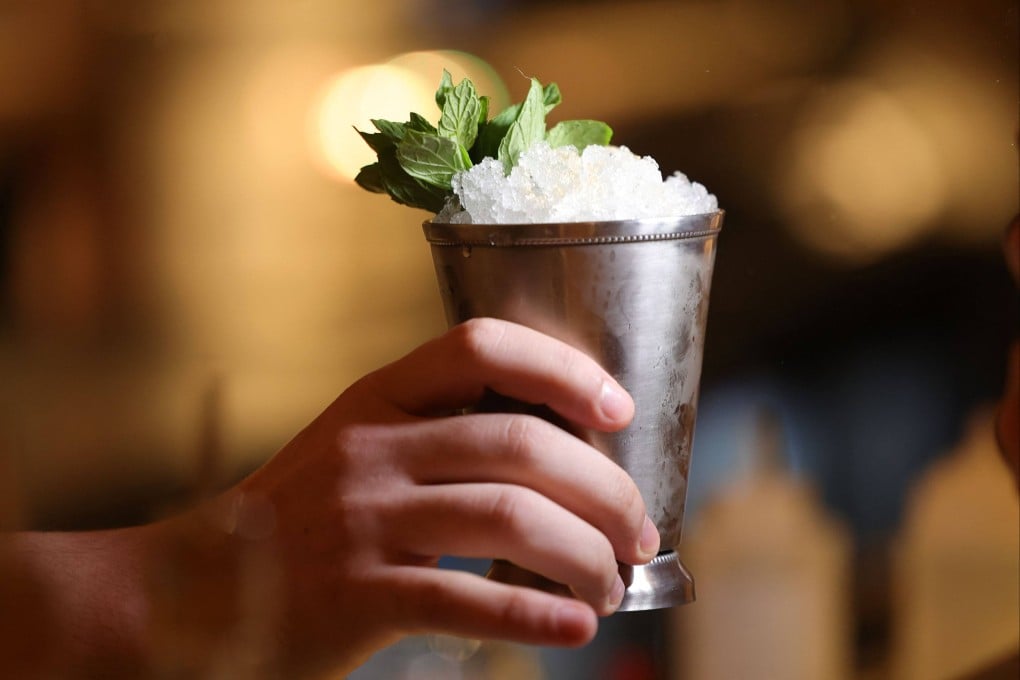 A bartender serves a drink at a pop-up bar in Riyadh offering non-alcoholic cocktails. Saudi Arabia opened its first-ever liquor store this year. Photo: AFP