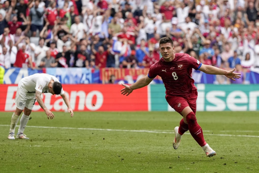 Serbia’s Luka Jovic celebrates his goal in Munich, which snatched his side a point. Photo: AP