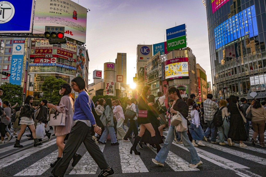 Pedestrians in Tokyo’s Shibuya district. Japan’s inflation has been much slower than in other countries like the United States, where central banks have aggressively raised interest rates. Photo: Bloomberg