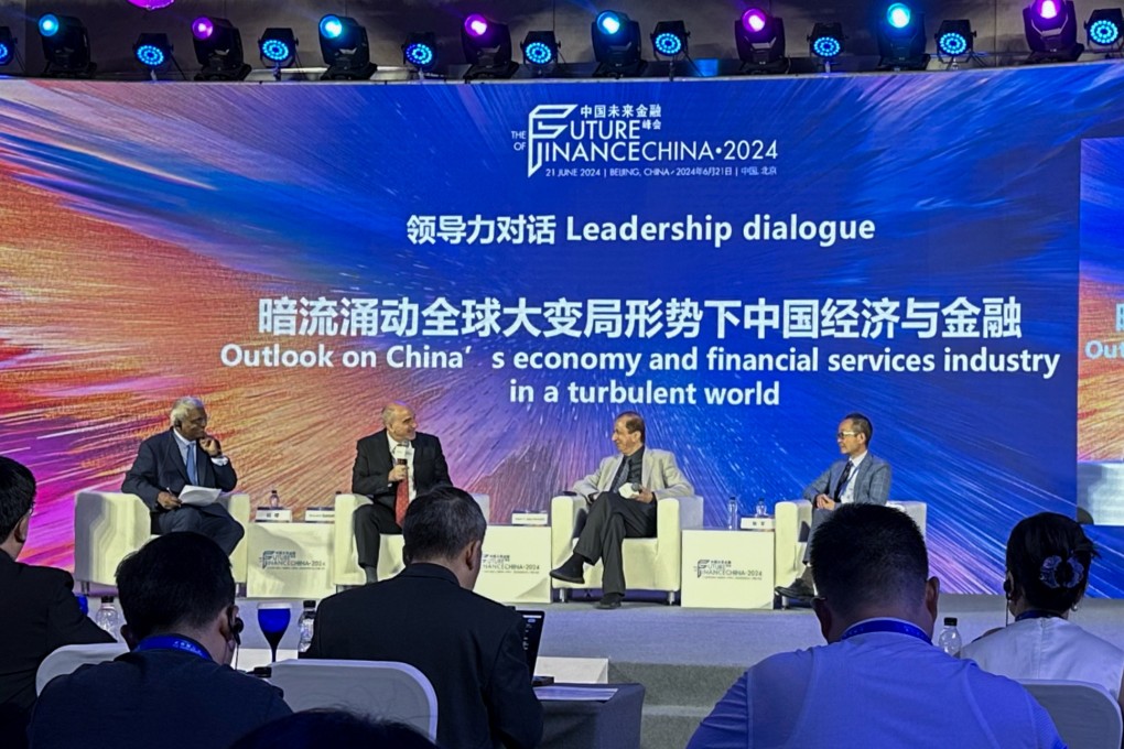 Panellists take part in a discussion at the Future of Finance China Conference in Beijing on Friday. Photo: Yuke Xie