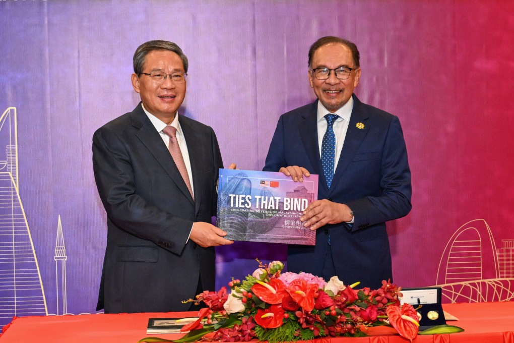 Chinese Premier Li Qiang and Malaysian Prime Minister Anwar Ibrahim at a reception in Kuala Lumpur on Wednesday celebrating 50 years of diplomatic ties. Photo: Xinhua
