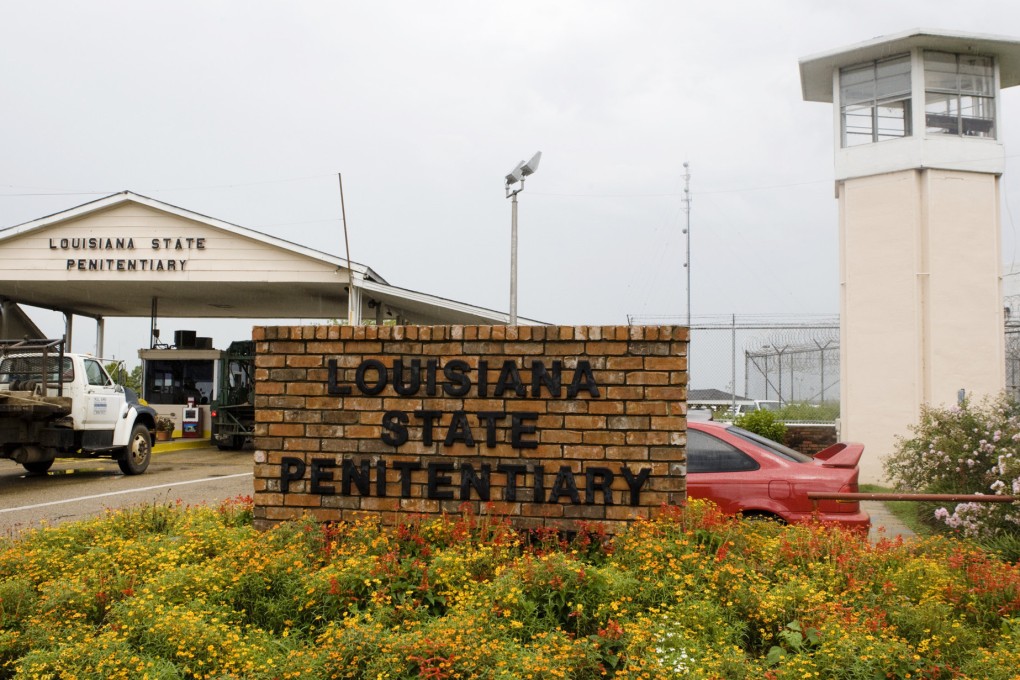 Vehicles enter at the main security gate at the Louisiana State Penitentiary in Angola, Louisiana, in August 2008. Photo: AP