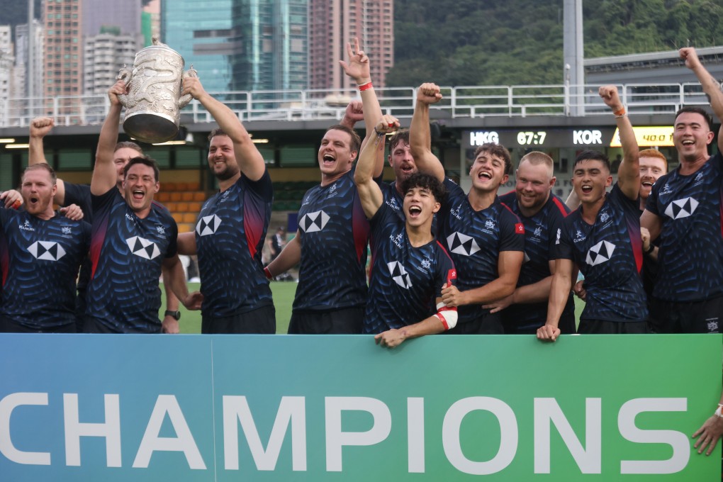 Triumphant Hong Kong celebrate clinching a fifth straight Asia Rugby Championship title. Photo: Jonathan Wong