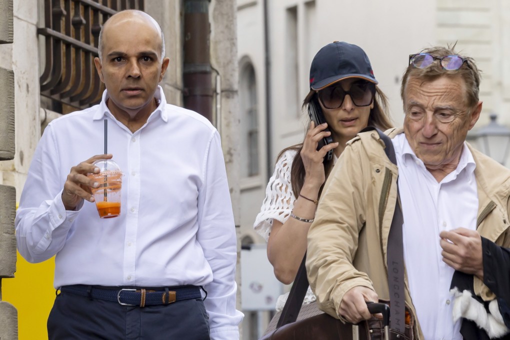 Ajay Hinduja (left) and his wife, Namrata, arrive with their lawyer Robert Assael at the courthouse in Geneva on June 10. Photo: EPA-EFE