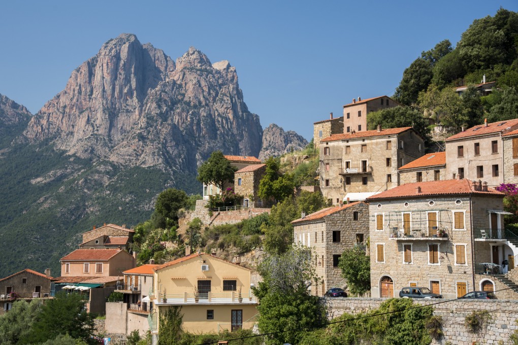 The village of Ota clings to a hillside in Corsica, one of the stops on our correspondent’s road trip around Corsica. The French island, birthplace of Napoleon, has jagged mountains and beautiful beaches; if only the locals didn’t drive so aggressively. Photo: Tim Pile