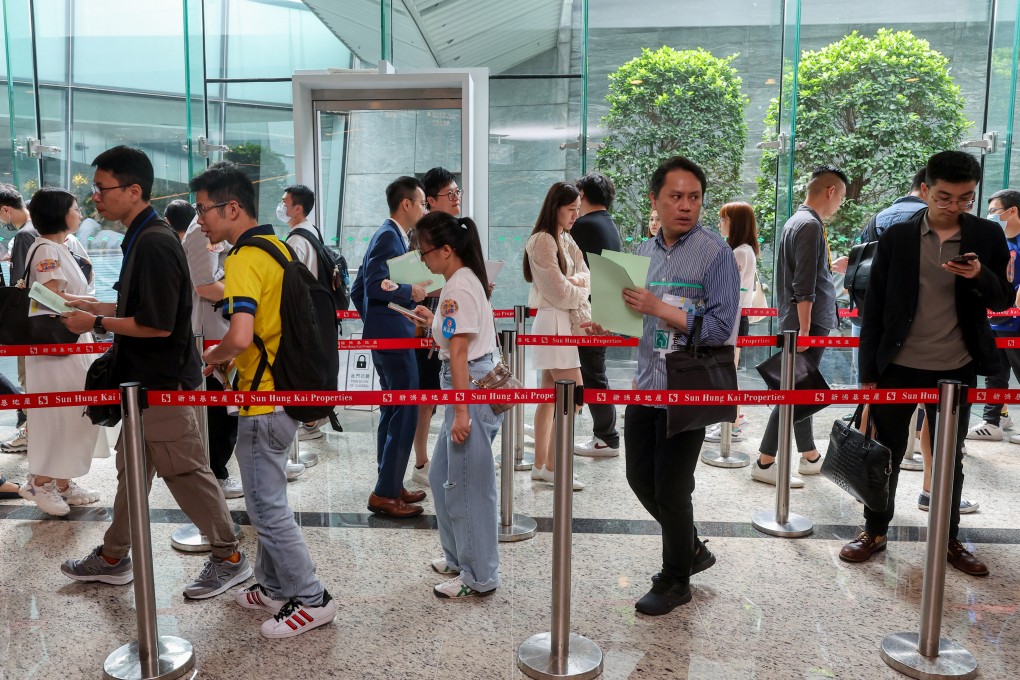 Potential buyers at the sales office of SHKP’s Novo Land at the International Commerce Centre in West Kowloon. Photo: Edmond So