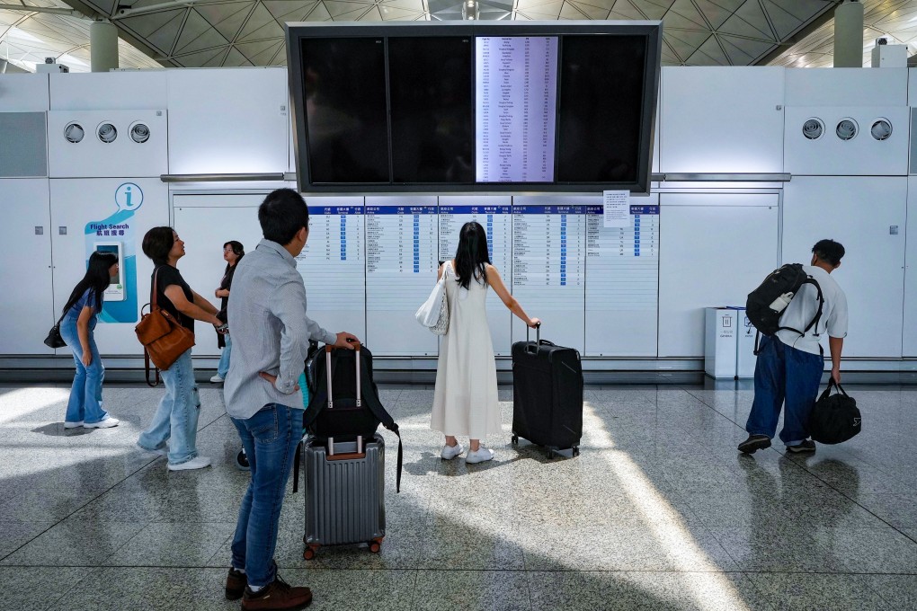 Flight information is not being displayed in the airport because of the computer failure. Photo: Elson Li