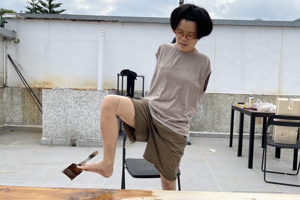 Installation and performance artist Yeung Siu-fong paints using her foot at the c.95d8 art collective’s village house in Sai Kung, Hong Kong. The collective’s “crip art” platform is helping bring disabled artists’ experiences to the public arena. Photo: c.95d8