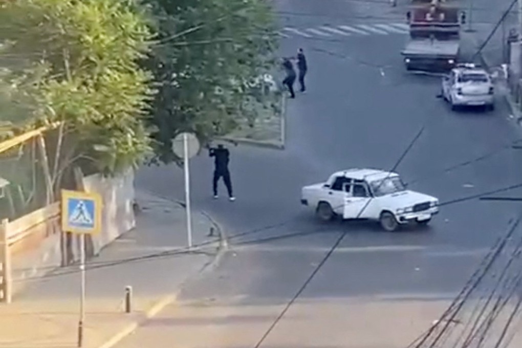 A shooting scene on a street in Makhachkala in Dagestan, southern Russia. Photo: from video obtained by Reuters