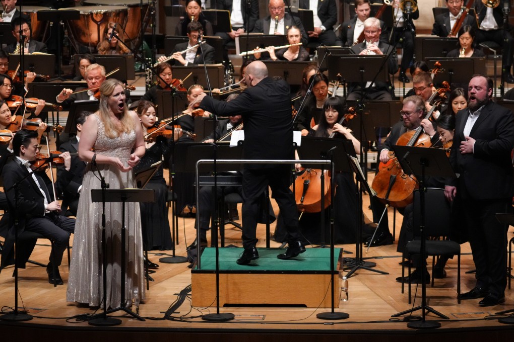 Soprano Jennifer Holloway (left) and bass-baritone Brian Mulligan (right) with the Hong Kong Philharmonic Orchestra under music director Jaap van Zweden during the June 21, 2024 performance of Richard Wagner’s opera The Flying Dutchman. Photo: Desmond Chan/HK Phil