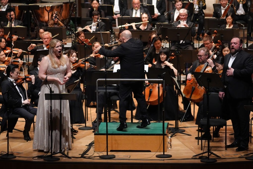 Soprano Jennifer Holloway (left) and bass-baritone Brian Mulligan (right) with the Hong Kong Philharmonic Orchestra under music director Jaap van Zweden during the June 21, 2024 performance of Richard Wagner’s opera The Flying Dutchman. Photo: Desmond Chan/HK Phil