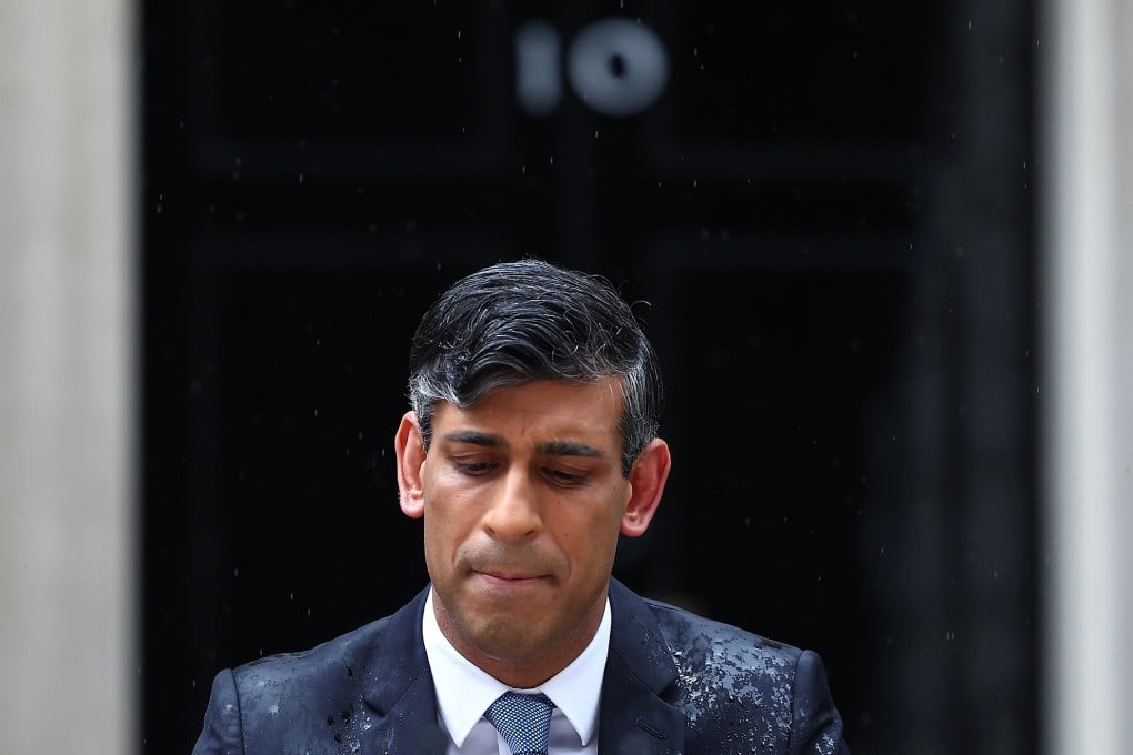 A rain-soaked Rishi Sunak announcing the July 4 UK election in London, on May 22. Photo: Getty Images / TNS