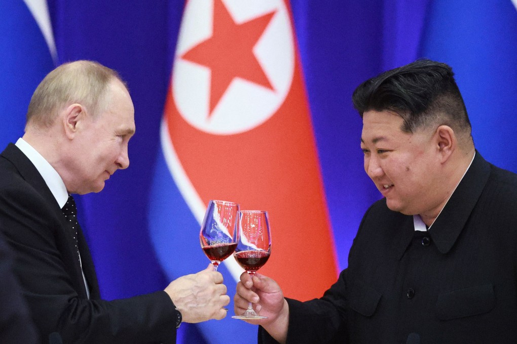 Russian President Vladimir Putin and North Korean leader Kim Jong-un during a reception in Pyongyang on June 19. Photo: Sputnik/AFP/TNS