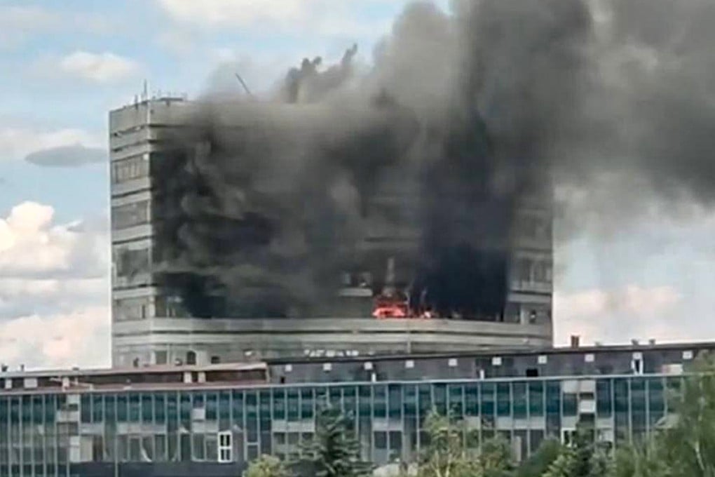 Thick plumes of smoke rise from windows throughout the multistorey office building. Photo: Moscow Region Governor Andrei Vorobyev official telegram channel via AP