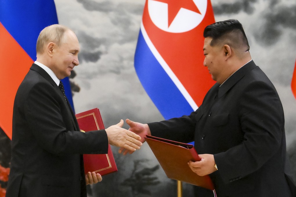 Russian President Vladimir Putin and North Korea’s leader Kim Jong-un shake hands during a signing ceremony in Pyongyang on Wednesday. Photo: AP