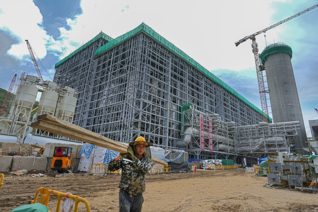 On June 19, a worker moves equipment at the construction site of I·PARK1, Hong Kong’s first waste-to-energy facility for treating municipal solid waste. Getting the hardware ready is the easy part. The more difficult challenge is to get households to sort waste properly for combustion and recycling. Photo: Sam Tsang