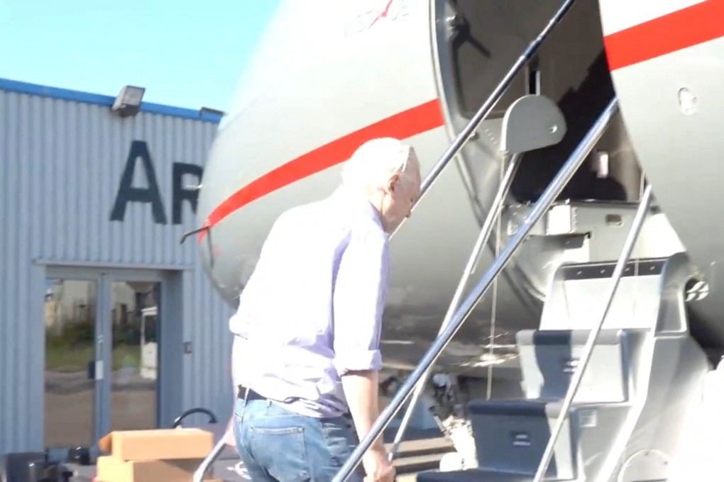 Julian Assange boarding a private jet on Monday. Photo: @wikileaks via X