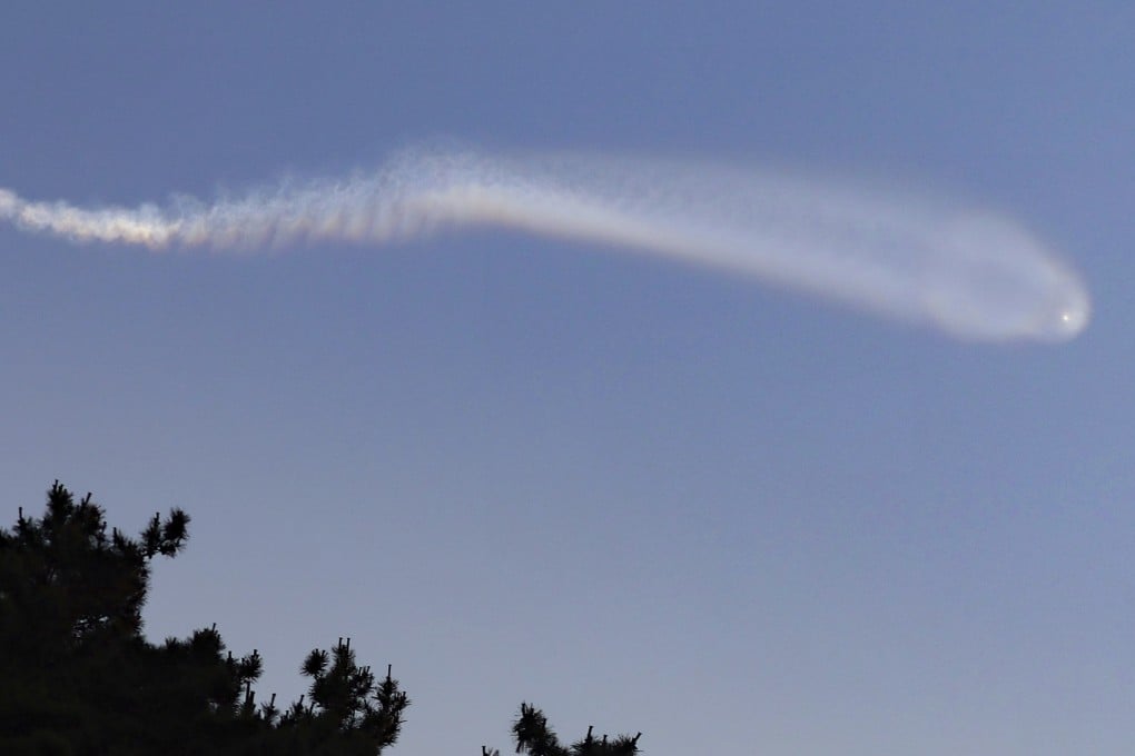 Contrails believed to be created by a North Korean hypersonic missile test are seen off Yeonpyeong Island, South Korea, on Wednesday. Photo: AP