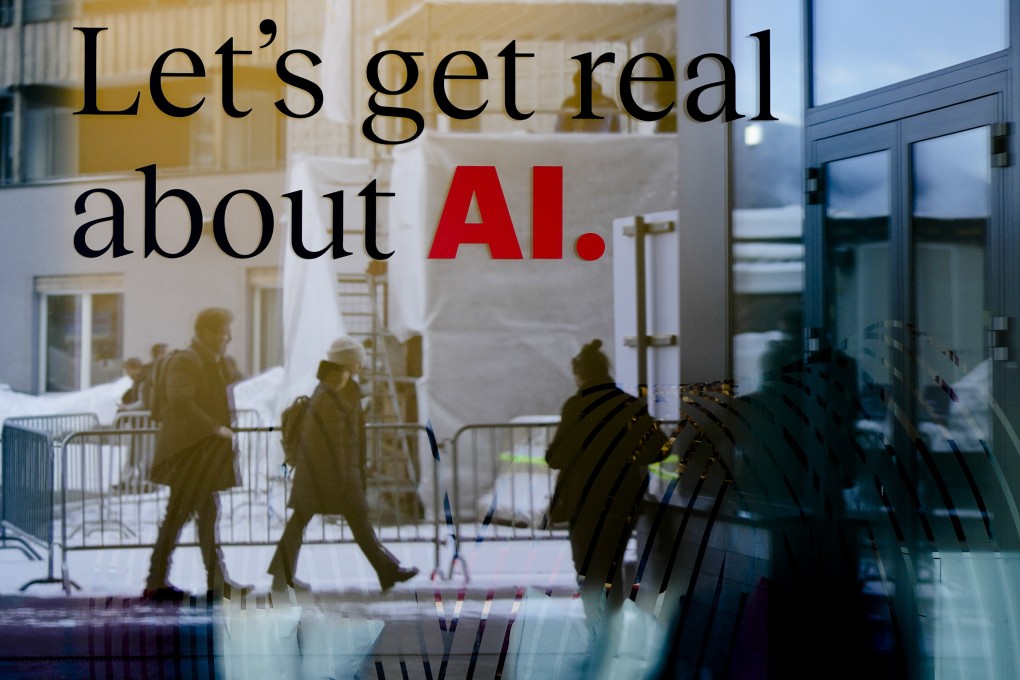 Pedestrians pass a window of a hotel at the Davos Promenade in Davos, Switzerland, on January 15. Artificial intelligence’s great promise must be balanced with an assessment of, and preparation for, its effects in the labour market and wider society. Photo: AP