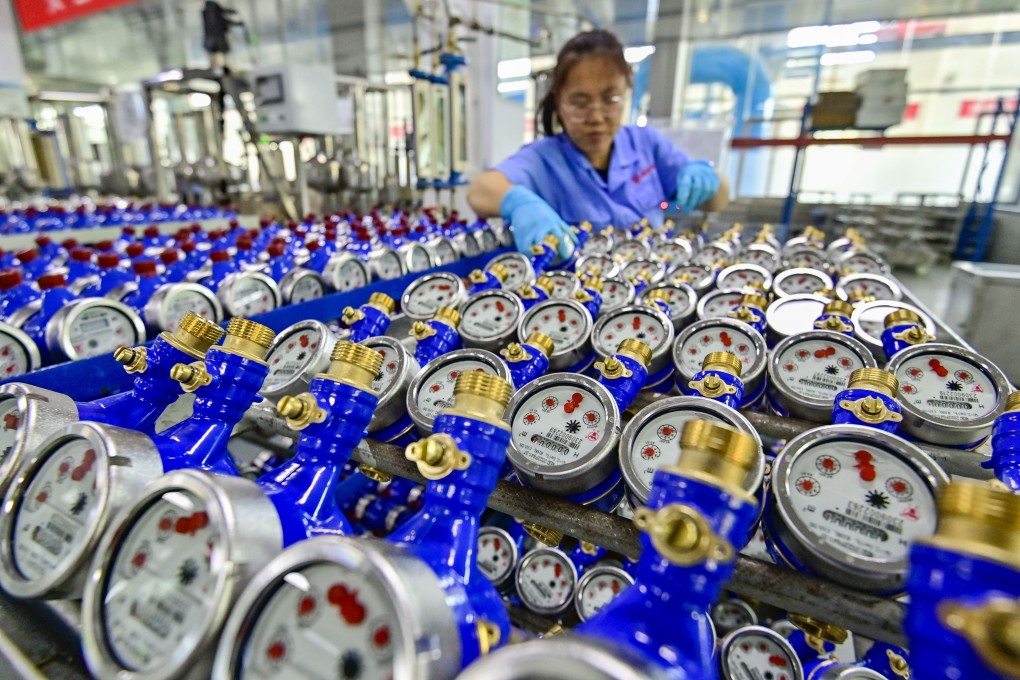 A worker arranges products that are about to roll off the production line at a smart water meter manufacturer in Qingzhou, Shandong province, China, September 27, 2023. Profit for Chinese industrial companies increased 0.7 per cent from a year earlier in May, decelerating from a 4 per cent gain in the previous month, the statistics bureau said on Thursday. Photo: Getty Images