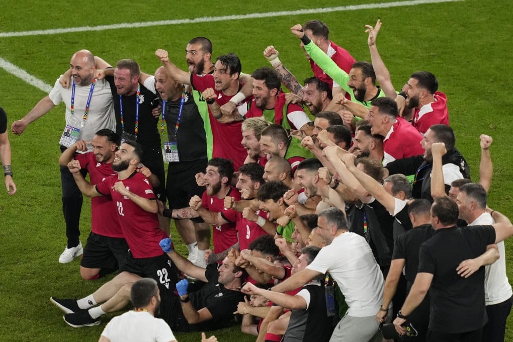 Georgia’s players celebrate after their historic win over Portugal to reach the Euros knock-out phase for the first time. Photo: AP