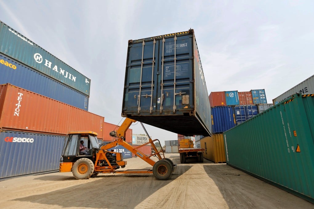 A crane moves containers at a “dry port” in India’s Gujarat state. The new deepwater port at Vadhavan will be one of the world’s largest once completed. Photo: Reuters