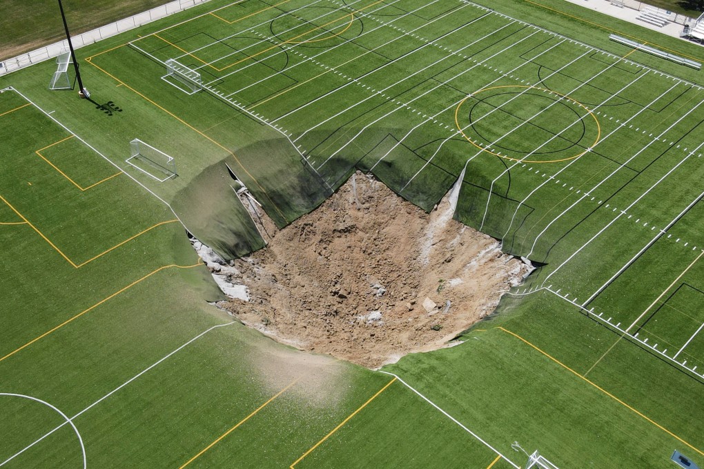 A drone view shows a sinkhole that formed on a soccer field at Gordon Moore Park in Alton, Illinois, on Thursday. Photo: Reuters
