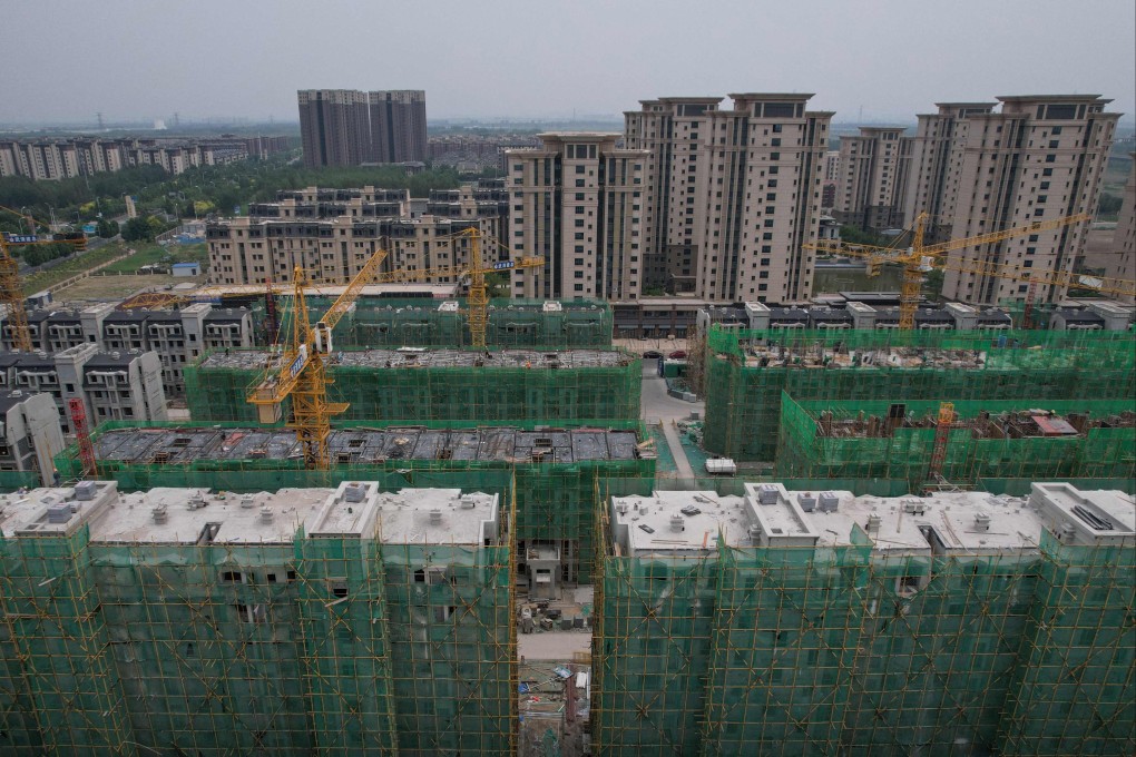 China’s ongoing crisis in the property market has stoked fears of an overseas spillover, an outcome most analysts say is unlikely. Photo: AFP