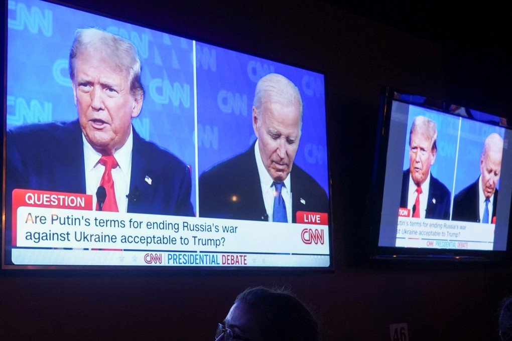 TV screens show US President Joe Biden and Republican presidential candidate Donald Trump. Photo: Reuters