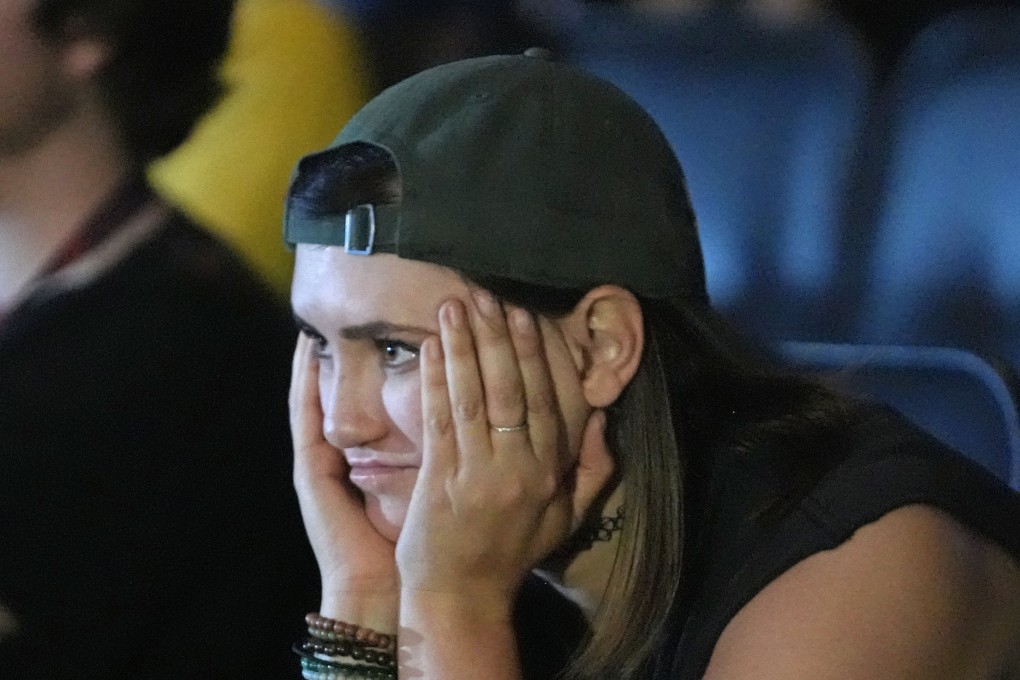 Sara Day, a supporter of President Joe Biden, watches coverage of the debate between Biden and former president Donald Trump in Utah. Photo: AP