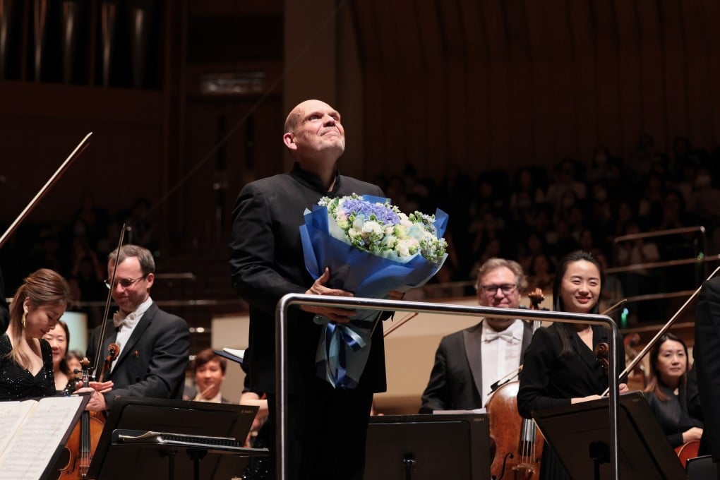 Jaap van Zweden and the Hong Kong Philharmonic Orchestra receive the applause of the audience at the end of his farewell concert on June 25, 2024. The Dutchman has stepped down as music director after 12 years. Photo: Keith Hiro/HK Phil