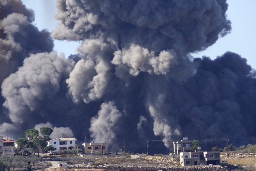 Black smoke rises from an Israeli air strike on the outskirts of Aita al-Shaab, a Lebanese border village in November, 2023. File photo: AP