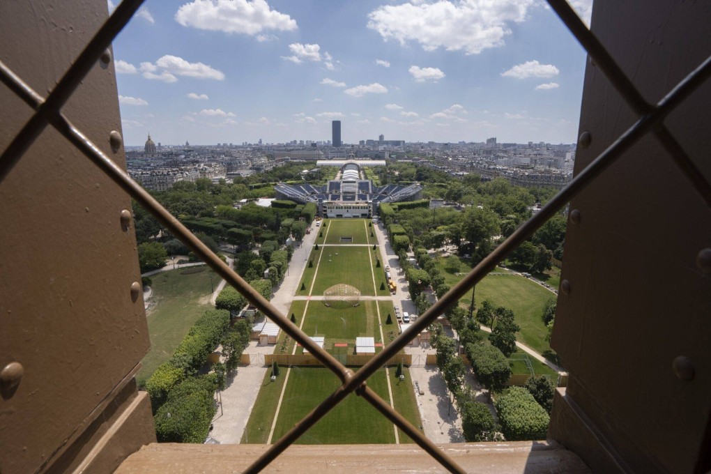 The Champs de Mars Arena and the Eiffel Stadium in preparation for the Paris Olympics. France has poured US$1.5 billion into cleaning up the Seine in time for the Games. Photo: Bloomberg