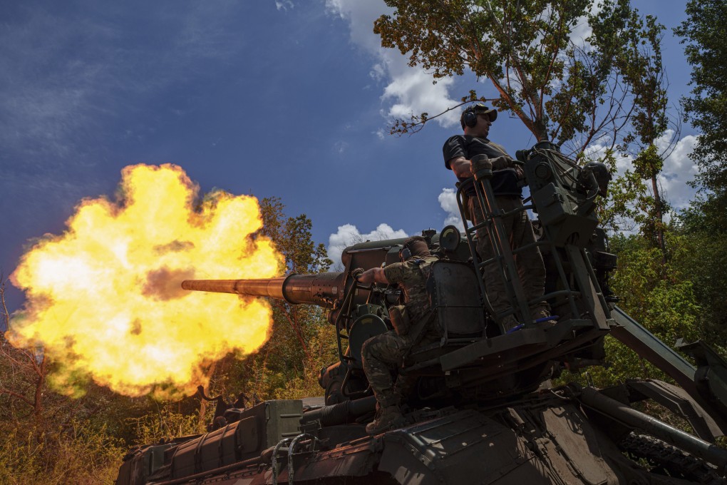 Ukrainian soldiers fire a self-propelled howitzer at Russian positions in the Donetsk region on Monday. Photo: AP