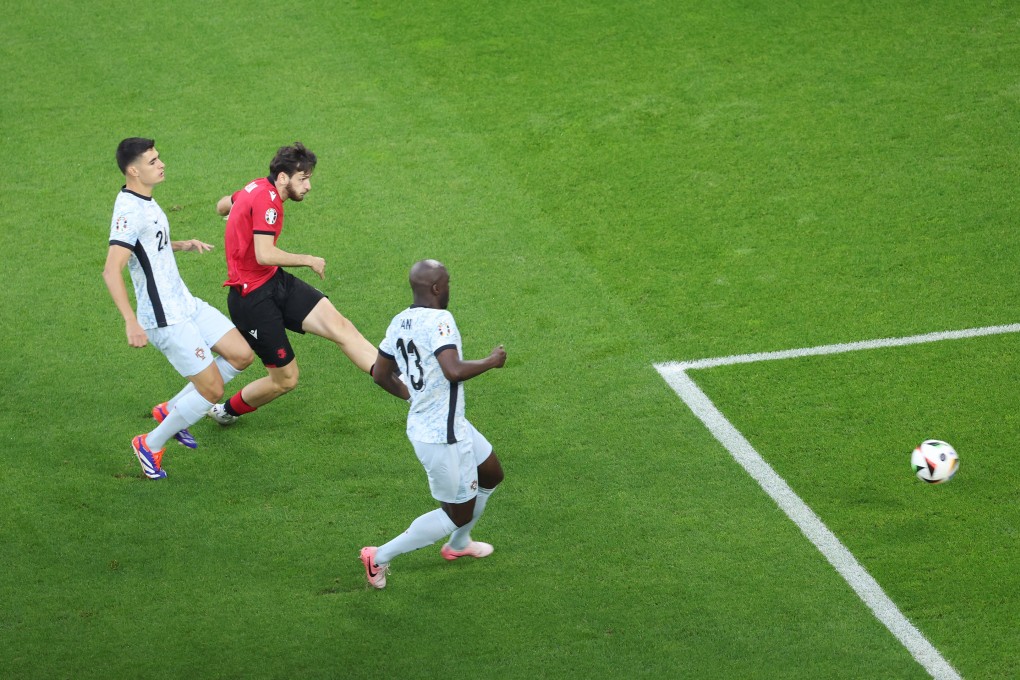 Khvicha Kvaratskhelia (centre) scores Georgia’s first goal in their 2-0 upset of Portugal at Euro 2024 - a feat a football expert feels China can emulate against Asia’s best. Photo: Xinhua