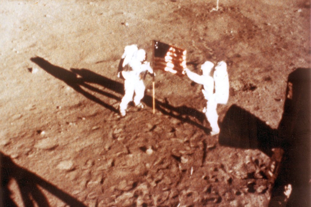 Neil Armstrong and Buzz Aldrin plant the US flag on the moon in 1969. The US is now in talks with China about how to protect it and other traces of the Apollo 11 mission. Photo: AFP