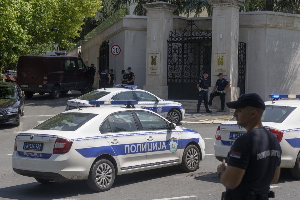 Police officers block off traffic at an intersection close to the Israeli embassy in Belgrade on Saturday. Photo: AP