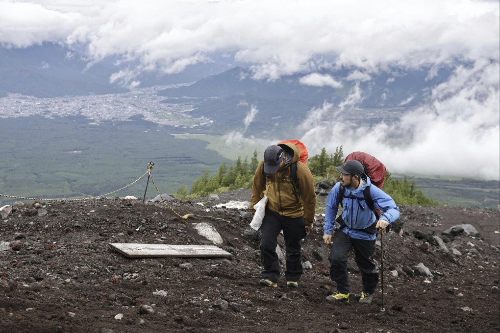Trekkers climb the Yoshida Trail to the top of Mount Fuji. Photo: Kyodo