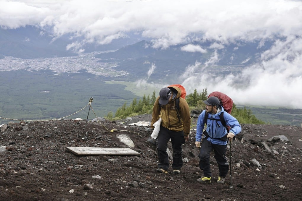 Trekkers climb the Yoshida Trail to the top of Mount Fuji. Photo: Kyodo