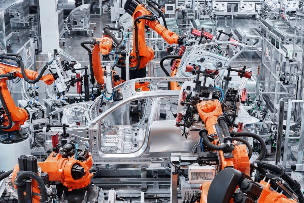 A photo taken on October 10, 2023, shows robots working on a car in a Nio manufacturing facility in Hefei, in east China’s Anhui Province. Photo: Xinhua
