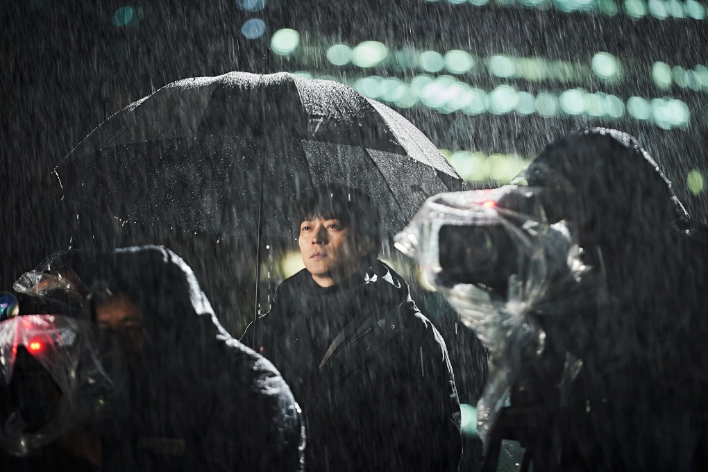 Gang Dong-won as Young-il, the troubled leader of a gang of assassins, in a still from The Plot (category IIB; Korean).