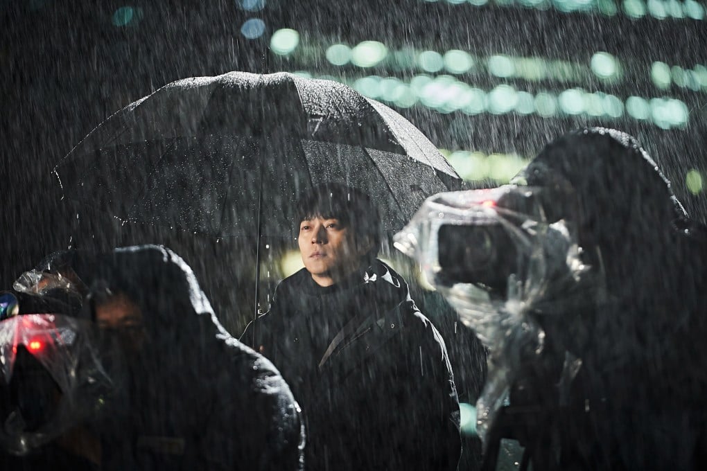 Gang Dong-won as Young-il, the troubled leader of a gang of assassins, in a still from The Plot (category IIB; Korean).