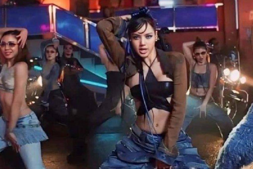 K-pop star Lisa from the band Blackpink has paid shopkeepers and passers-by cash compensation so she could close down a whole street in Bangkok’s Chinatown district to shoot a video for her new song. Photo: YouTube/LLOUD Official
