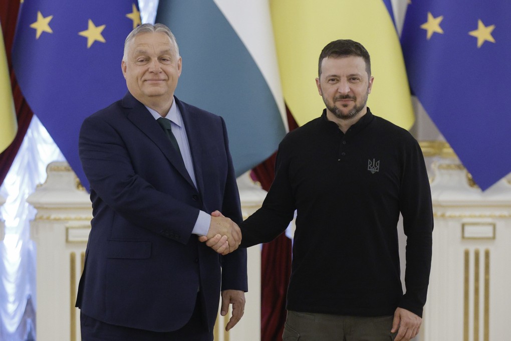 Ukrainian President Volodymyr Zelensky (right) shakes hands with Hungarian Prime Minister Viktor Orban during their meeting in Kyiv, Ukraine on Tuesday. Photo: EPA-EFE